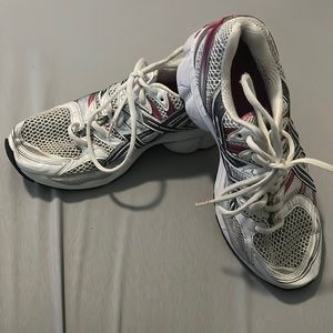 Women’s pink and white size 7.5 ASICS shoes.